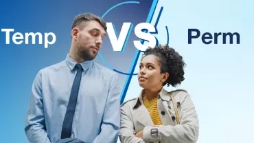 A temporary male employee and a female permanent employee standing side by side.