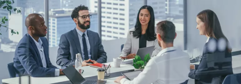 working professionals talking in a meeting